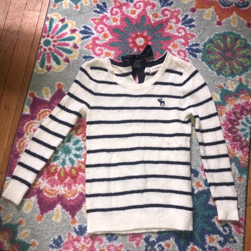 Off-white sweater with navy blue stripes